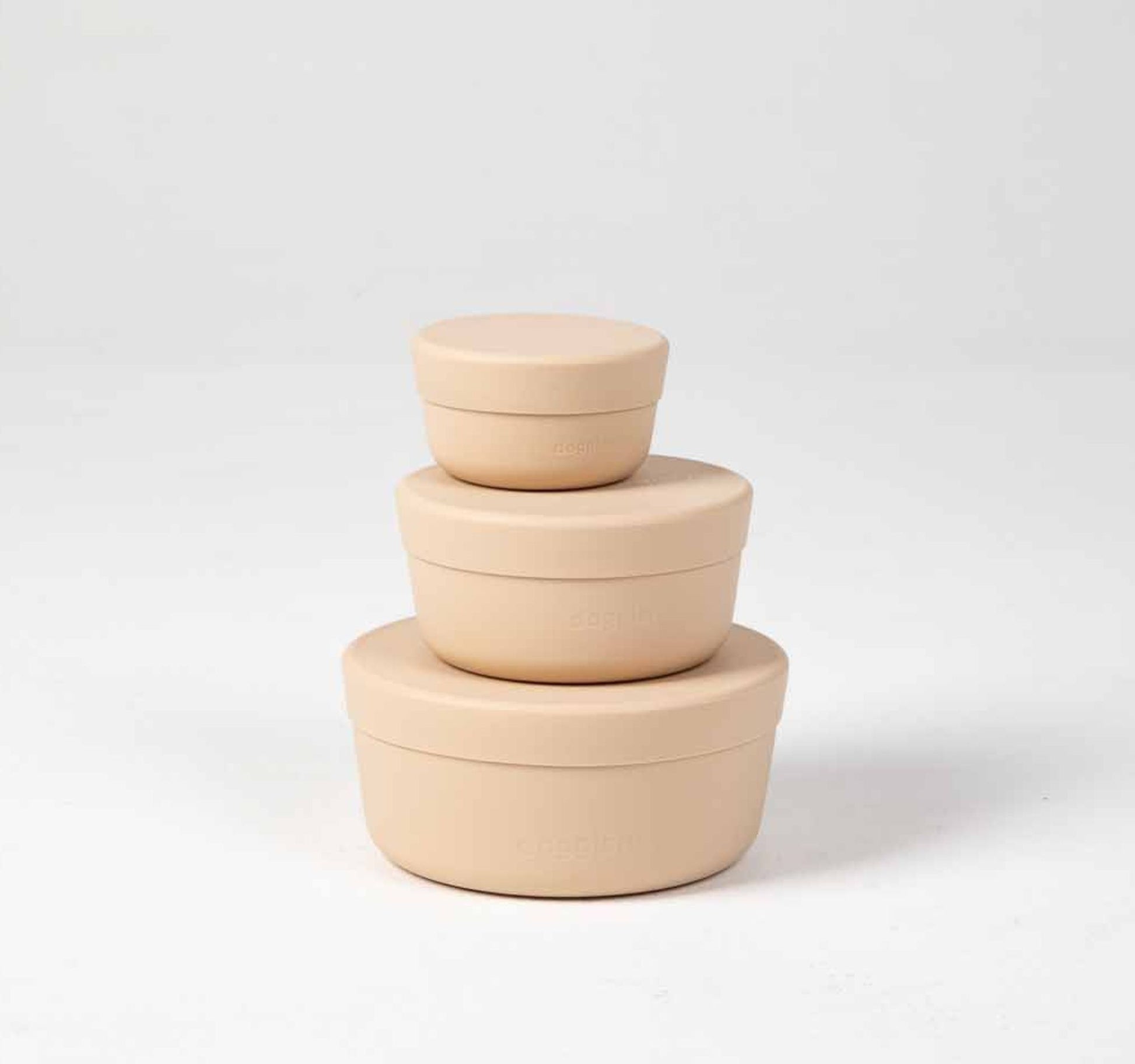 100% food grade silicone dog food storage nesting containers in three sizes 150ml, 350ml and 750ml in beige.