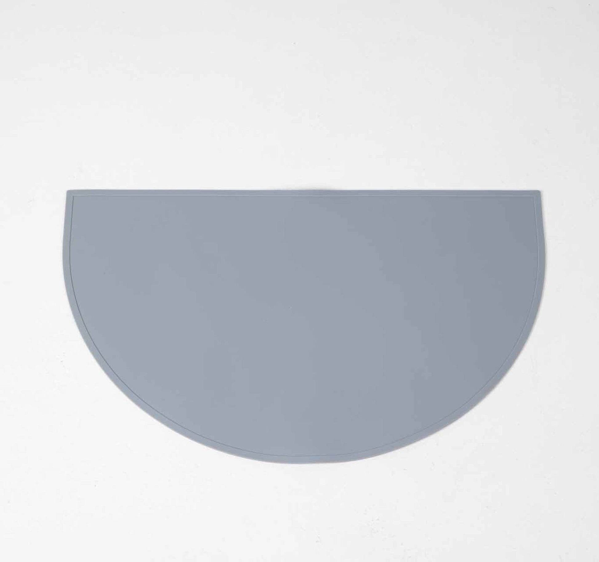 Dog Food & water mat made with 100% food-grade silicone with a non-slip base, raised edges to contain mess in blue.