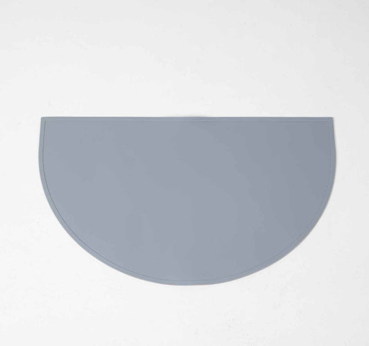 Dog Food & water mat made with 100% food-grade silicone with a non-slip base, raised edges to contain mess in blue.