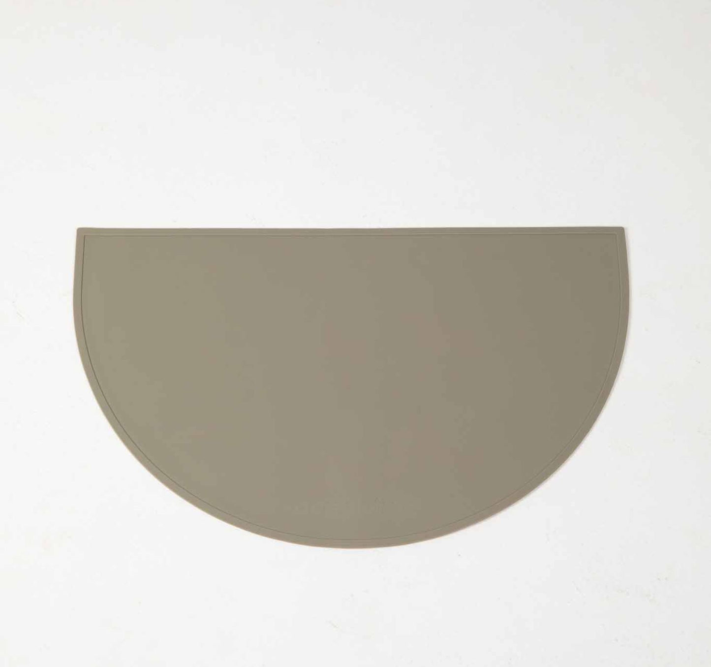 Dog Food & water mat made with 100% food-grade silicone with a non-slip base, raised edges to contain mess in green.