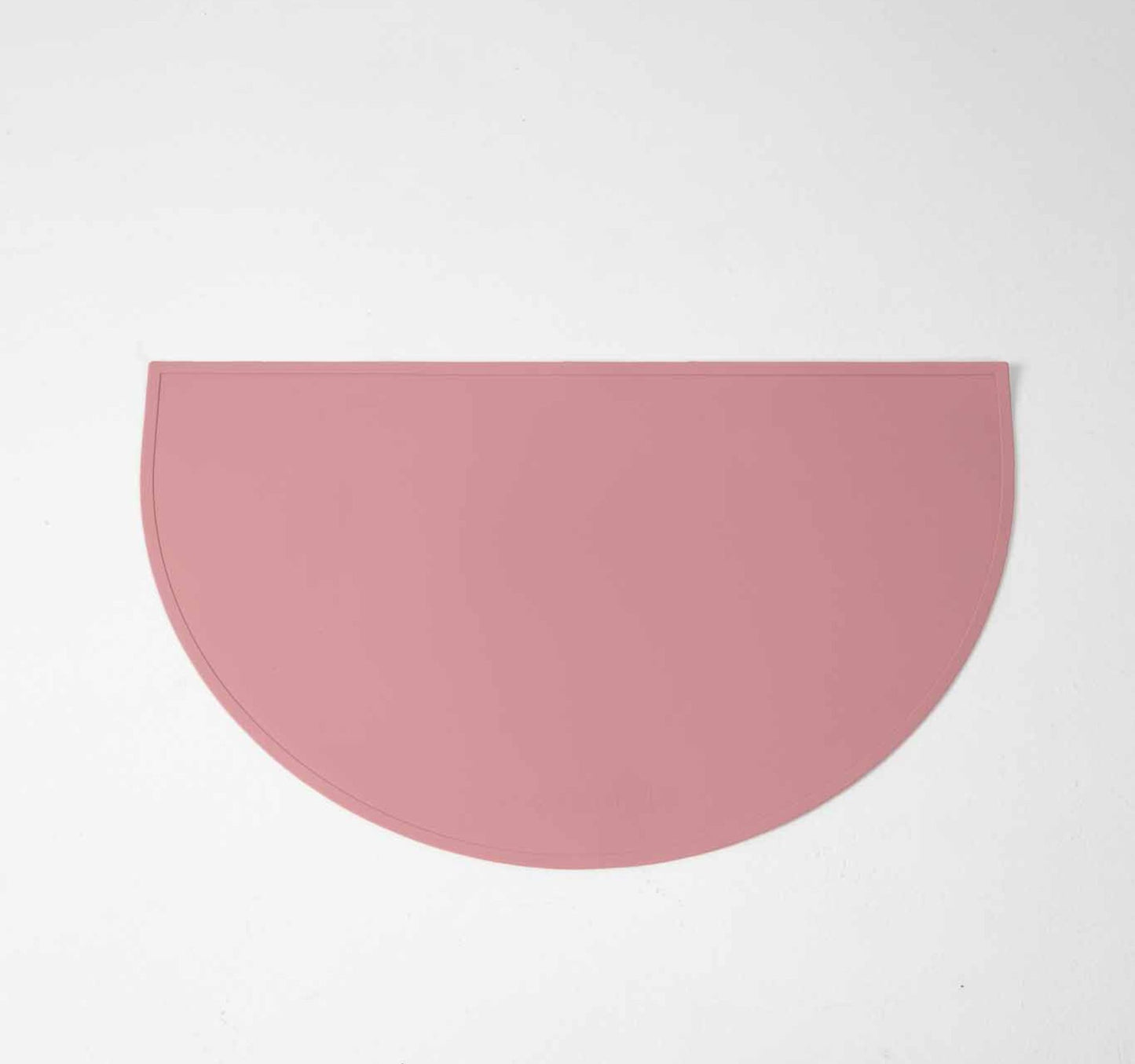 Dog Food & water mat made with 100% food-grade silicone with a non-slip base, raised edges to contain mess in pink.