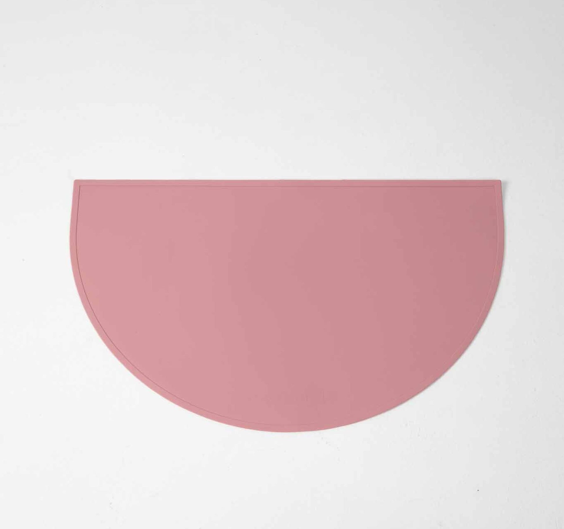 Dog Food & water mat made with 100% food-grade silicone with a non-slip base, raised edges to contain mess in pink.